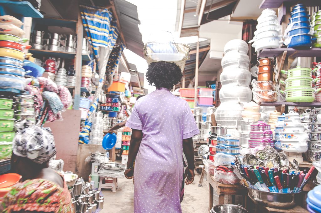 (Woman shopping in market) 
Tour Guides' Top 5 Favourite Sites in Accra